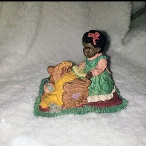 Girl Reading to Teddy